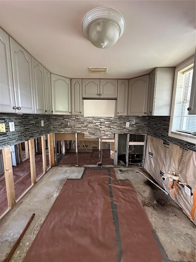 kitchen with concrete flooring