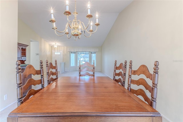 carpeted dining space featuring lofted ceiling and a notable chandelier