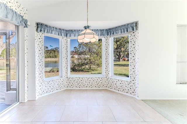 unfurnished dining area with tile patterned floors