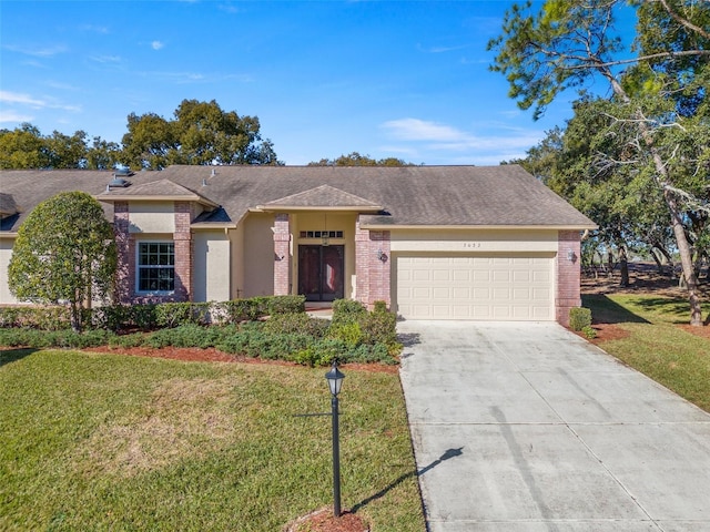 ranch-style house with a front yard and a garage