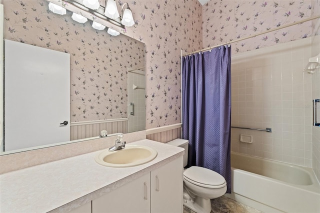 full bathroom featuring toilet, shower / bath combo, and vanity