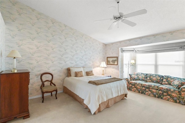 bedroom with ceiling fan and carpet