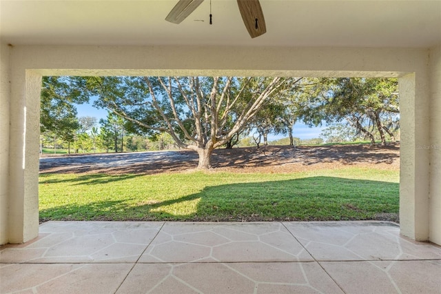 view of patio / terrace featuring ceiling fan