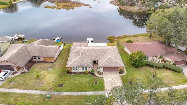 bird's eye view with a water view