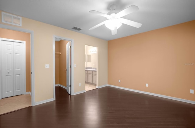 interior space featuring ceiling fan and wood-type flooring