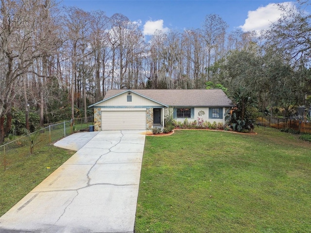 ranch-style home with a garage and a front yard