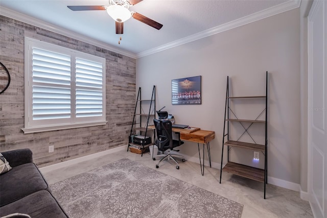 office space with ornamental molding, ceiling fan, and wooden walls