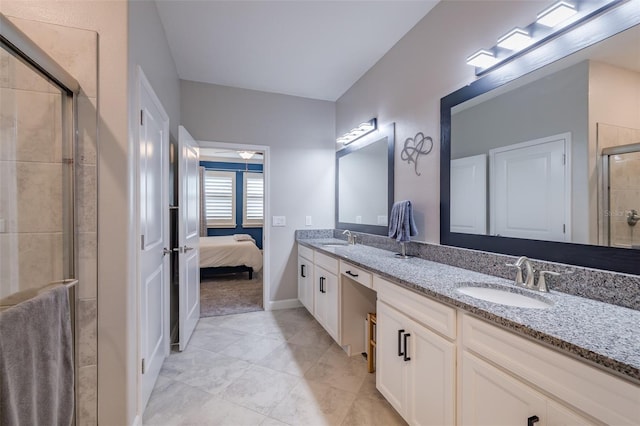 bathroom with vanity and walk in shower