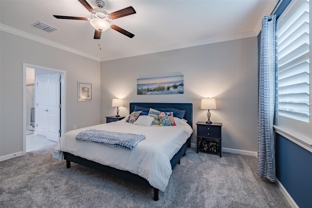 bedroom featuring carpet floors, ornamental molding, and ceiling fan