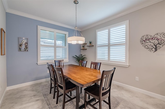 dining area featuring crown molding and a healthy amount of sunlight