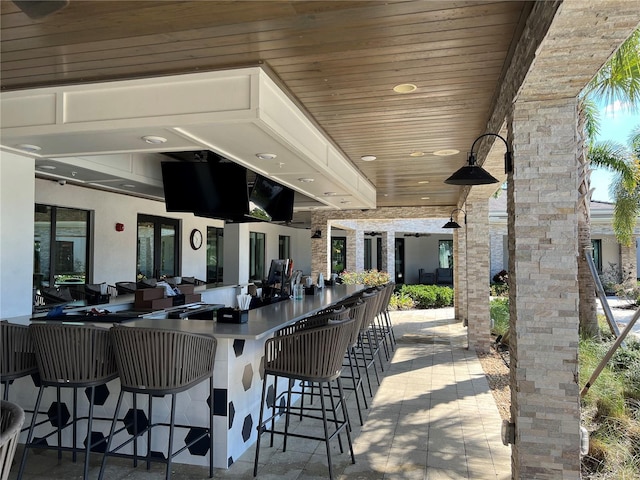 view of patio with a bar