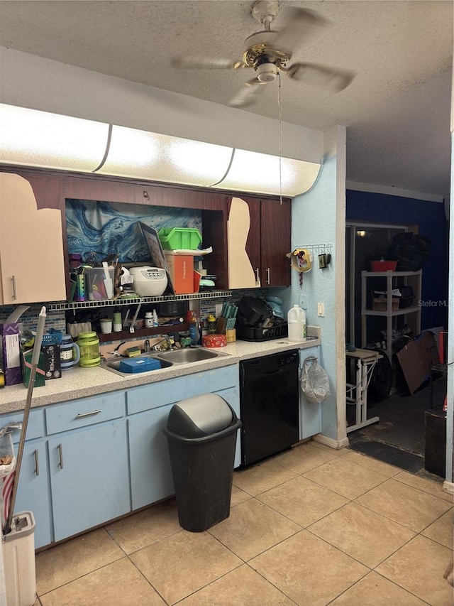 kitchen with a textured ceiling, dishwasher, sink, light tile patterned flooring, and ceiling fan