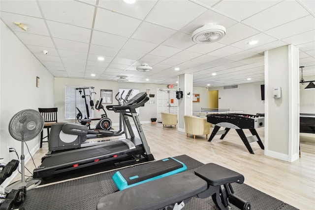 gym featuring light hardwood / wood-style floors