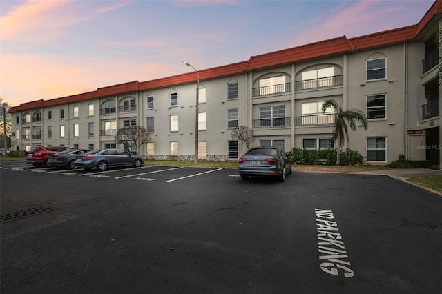 view of outdoor building at dusk