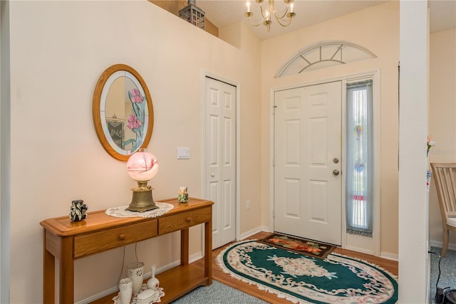 9639 Conservation Dr, New Port Richey, FL 34655 - foyer featuring a notable chandelier