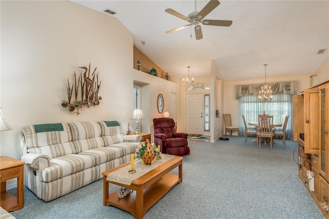 9639 Conservation Dr, New Port Richey, FL 34655 - living room with ceiling fan with notable chandelier and lofted ceiling
