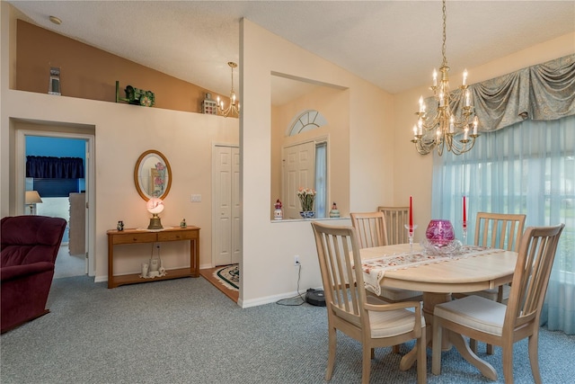 9639 Conservation Dr, New Port Richey, FL 34655 - carpeted dining area with vaulted ceiling