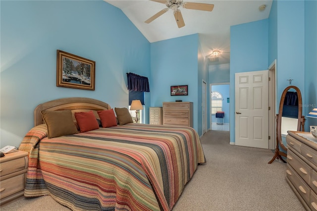 9639 Conservation Dr, New Port Richey, FL 34655 - carpeted bedroom with ceiling fan and high vaulted ceiling