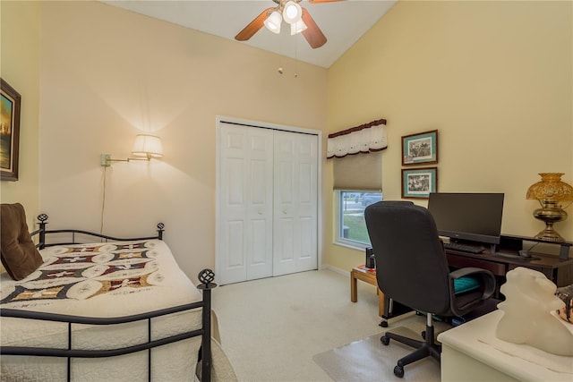 9639 Conservation Dr, New Port Richey, FL 34655 - carpeted bedroom with ceiling fan, a closet, and vaulted ceiling