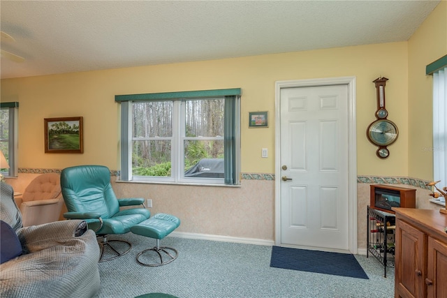 9639 Conservation Dr, New Port Richey, FL 34655 - interior space with a textured ceiling and light carpet