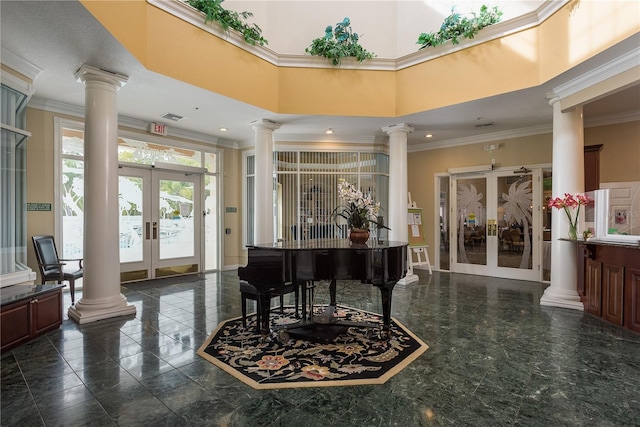9639 Conservation Dr, New Port Richey, FL 34655 - miscellaneous room featuring a high ceiling, french doors, and crown molding