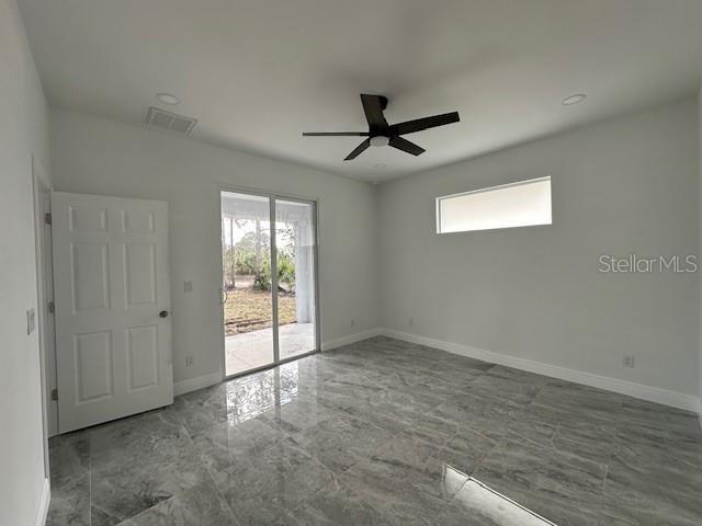 empty room with ceiling fan