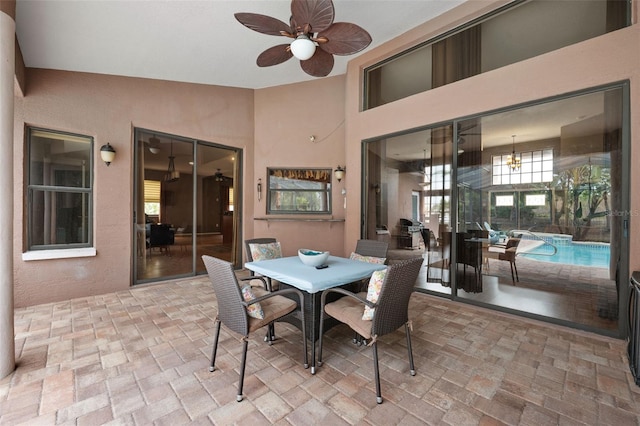 view of patio / terrace featuring ceiling fan