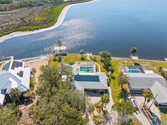 drone / aerial view with a water view