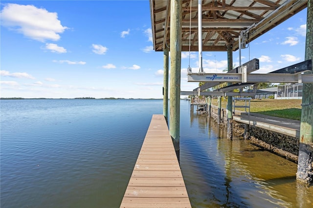 view of dock with a water view