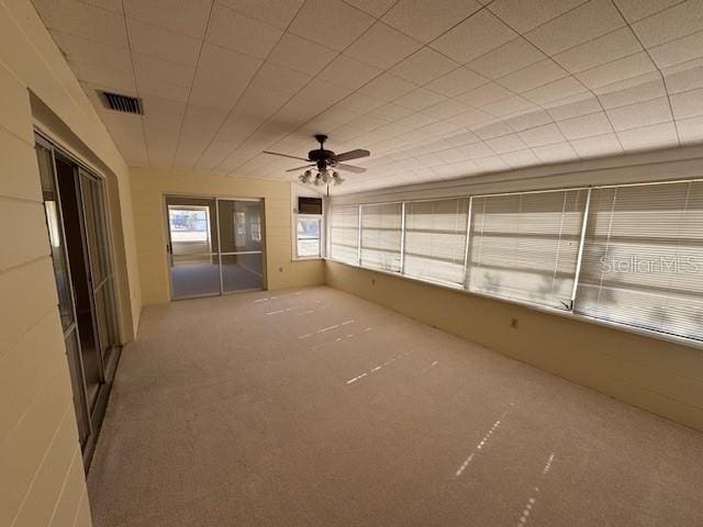 interior space featuring ceiling fan