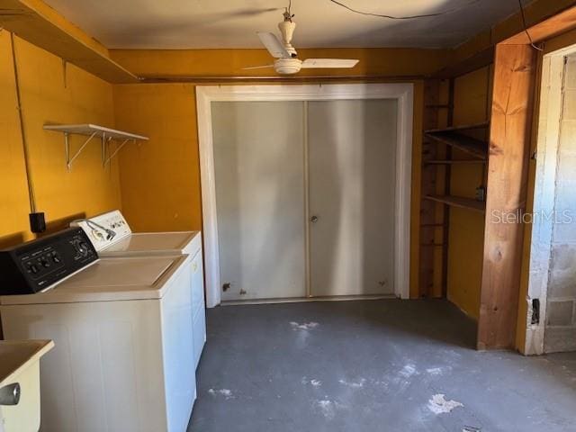 laundry area with ceiling fan, sink, and independent washer and dryer