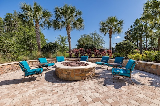 view of patio / terrace featuring a fire pit