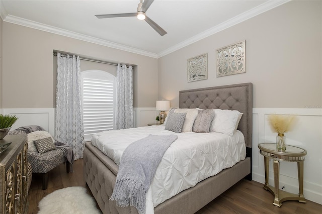 bedroom featuring dark wood-type flooring, ceiling fan, and crown molding