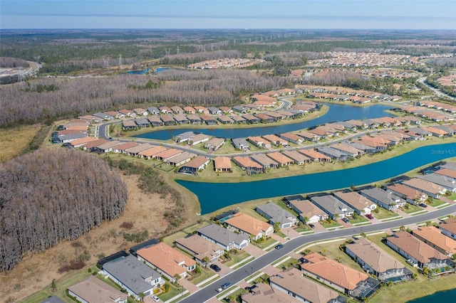 drone / aerial view with a water view