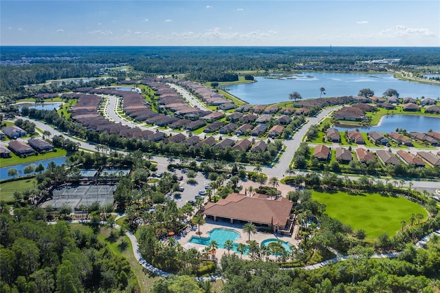 birds eye view of property featuring a water view