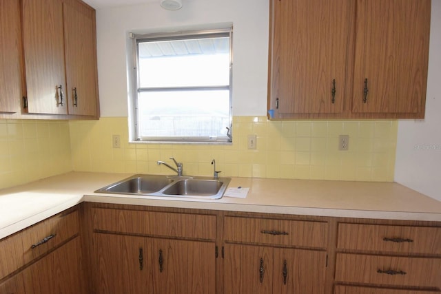 kitchen with sink and backsplash