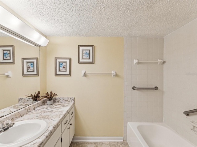 bathroom featuring vanity and a textured ceiling