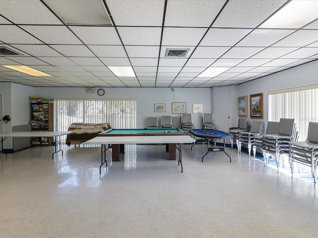 recreation room with a drop ceiling, pool table, and a healthy amount of sunlight