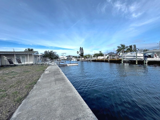 dock area featuring a water view