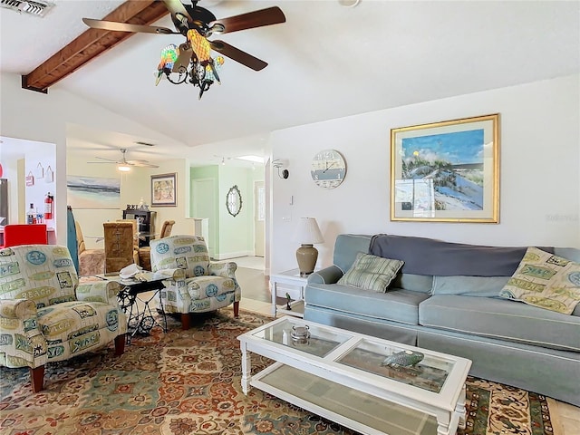 living room with vaulted ceiling with beams and ceiling fan