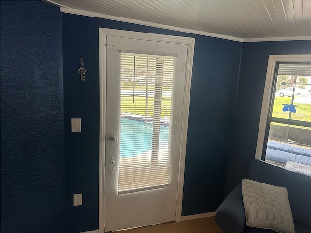 doorway featuring crown molding