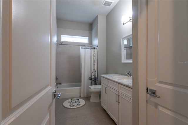 full bathroom with vanity, toilet, and shower / tub combo