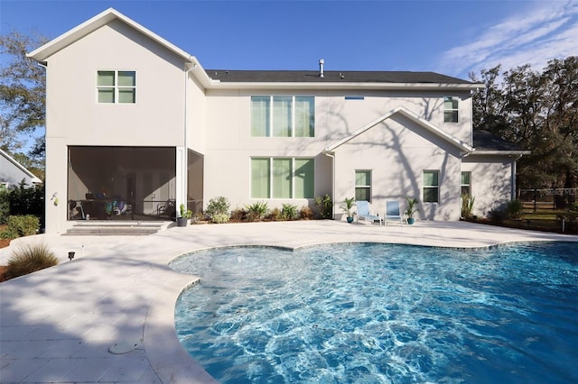 back of house featuring a patio