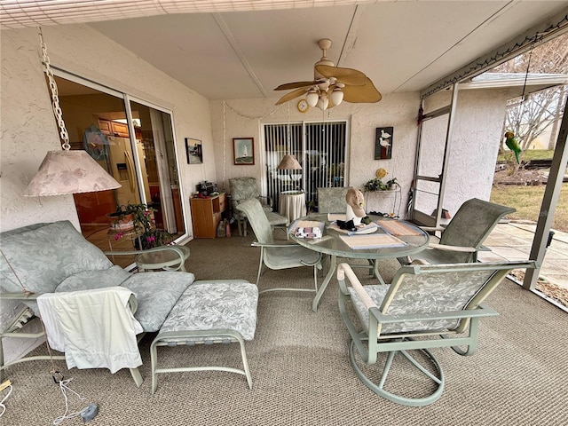 8111 Merrimac Dr, Port Richey, FL 34668 - sunroom with a ceiling fan