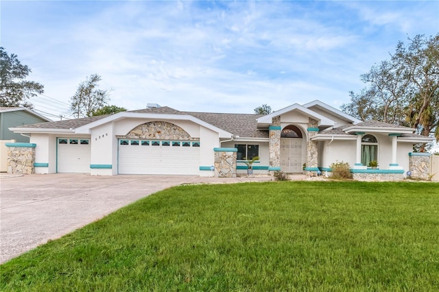 ranch-style home with a garage and a front yard