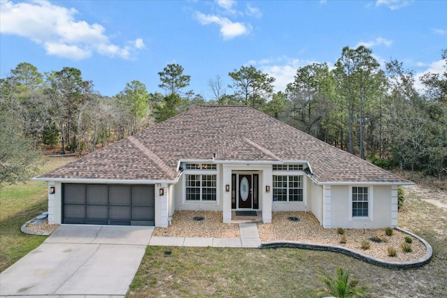 single story home with a garage