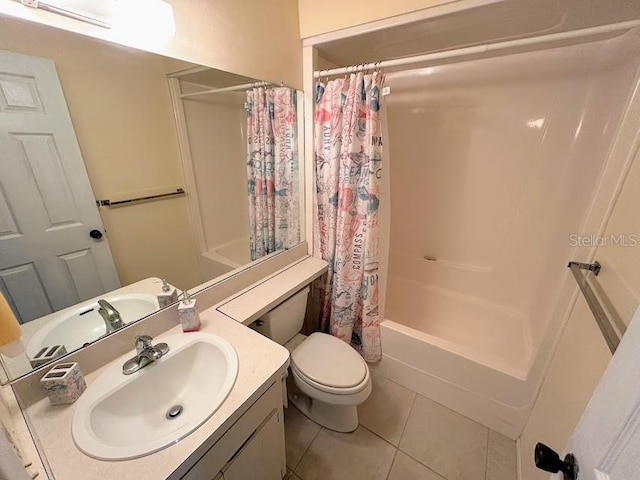 full bathroom with tile patterned floors, vanity, toilet, and shower / tub combo with curtain