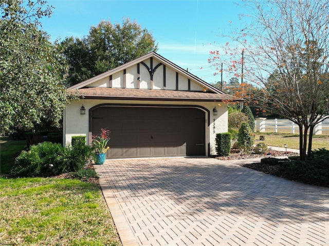 view of front of property with an outbuilding and a garage