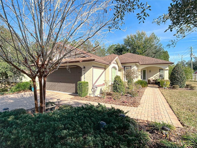 view of front of home featuring a garage