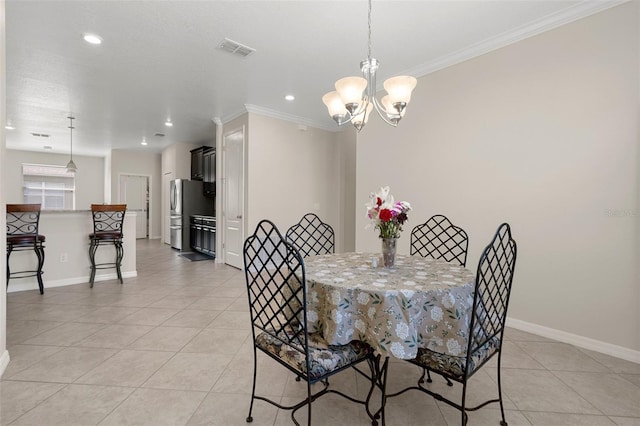 dining area featuring baseboards, visible vents, ornamental molding, an inviting chandelier, and light tile patterned flooring